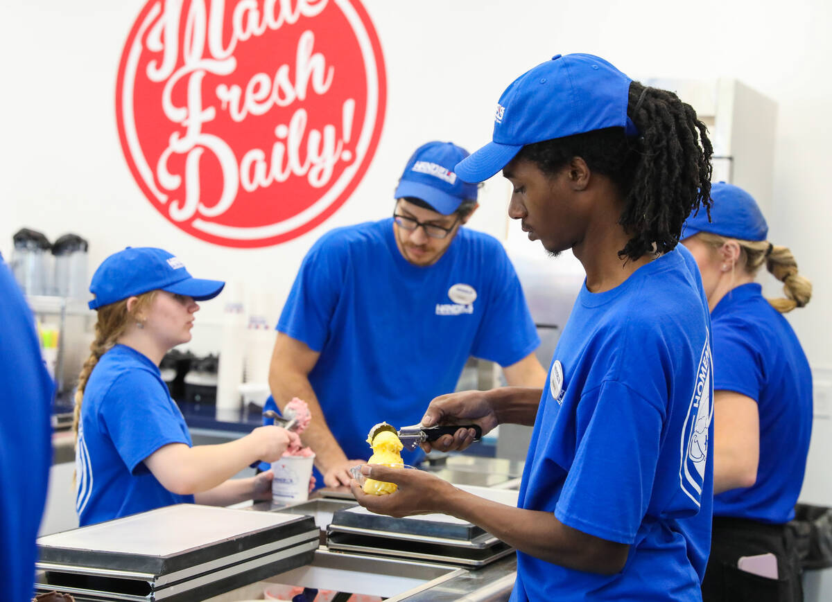 Charles Wayne scoops ice cream during the grand opening of Las Vegas’ third Handel's Hom ...