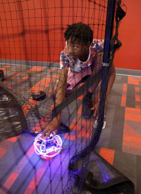 Xavior “X-man” Harris, 12, prepares for a drone soccer scrimmage during Drone Soc ...