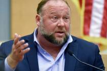 Conspiracy theorist Alex Jones takes the witness stand to testify at the Sandy Hook defamation ...