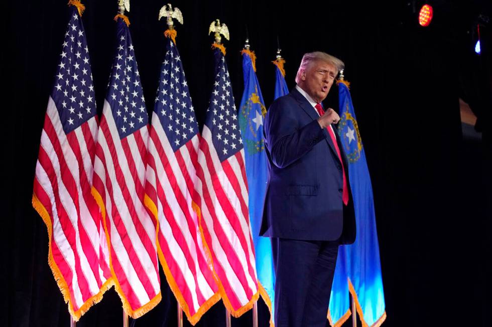 Former President Donald Trump motions before speaking at a campaign event, Saturday, July 8, 20 ...