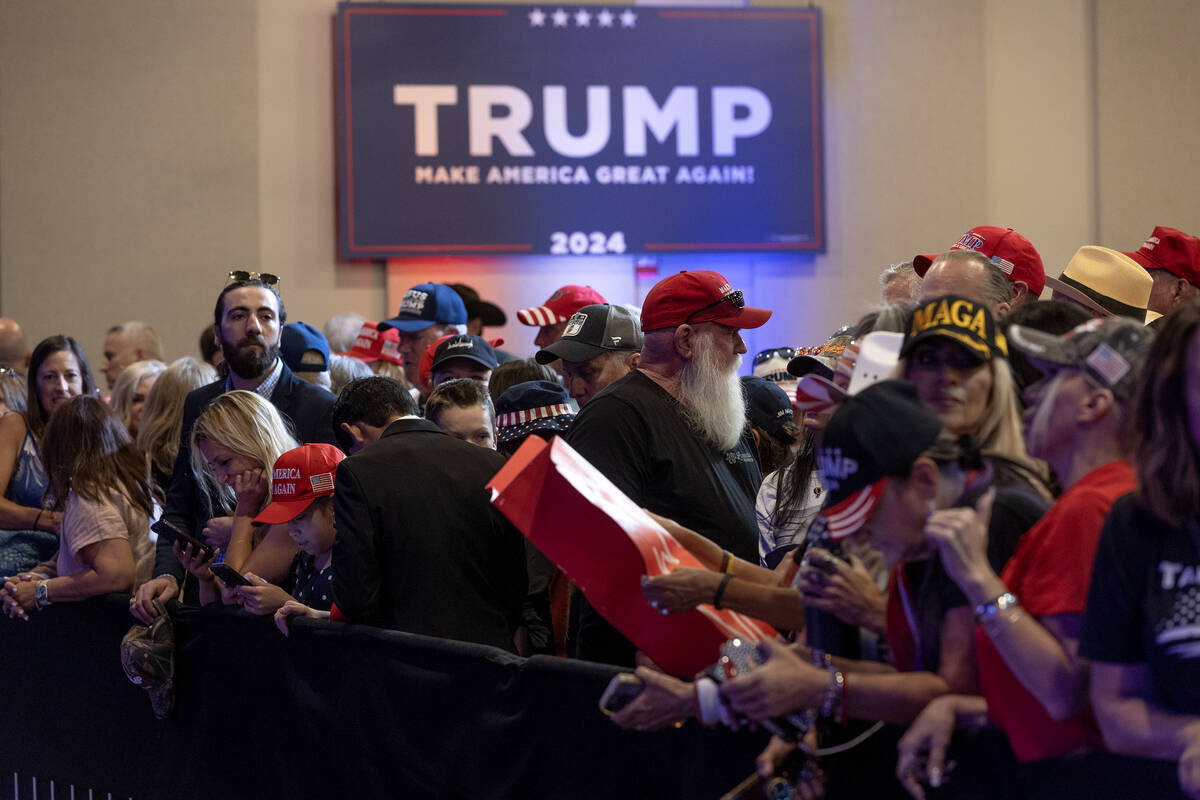 Attendees line up for former President Donald Trump’s speech during an organizing event ...