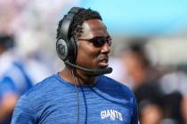 New York Giants assistant special teams coach Anthony Blevins walking the sideline during an NF ...