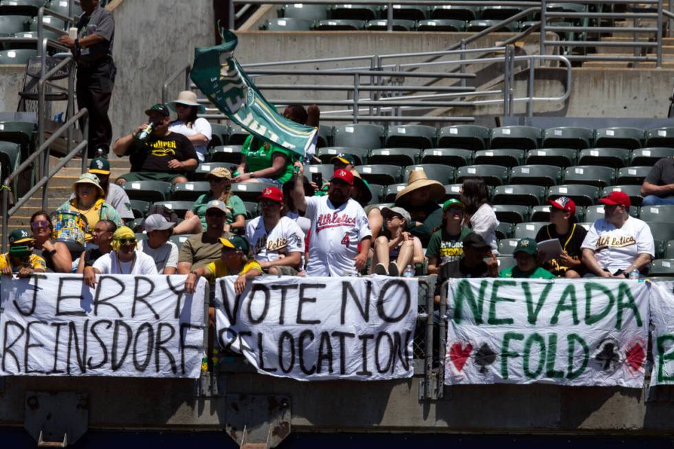 Oakland Athletics fans express their displeasure at the team's planned move to Las Vegas during ...