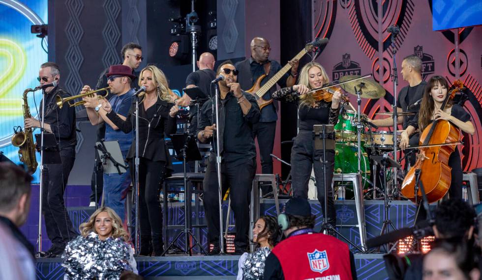 David Perrico 19-piece Raiders House Band performs at the Draft Theater during the second day s ...