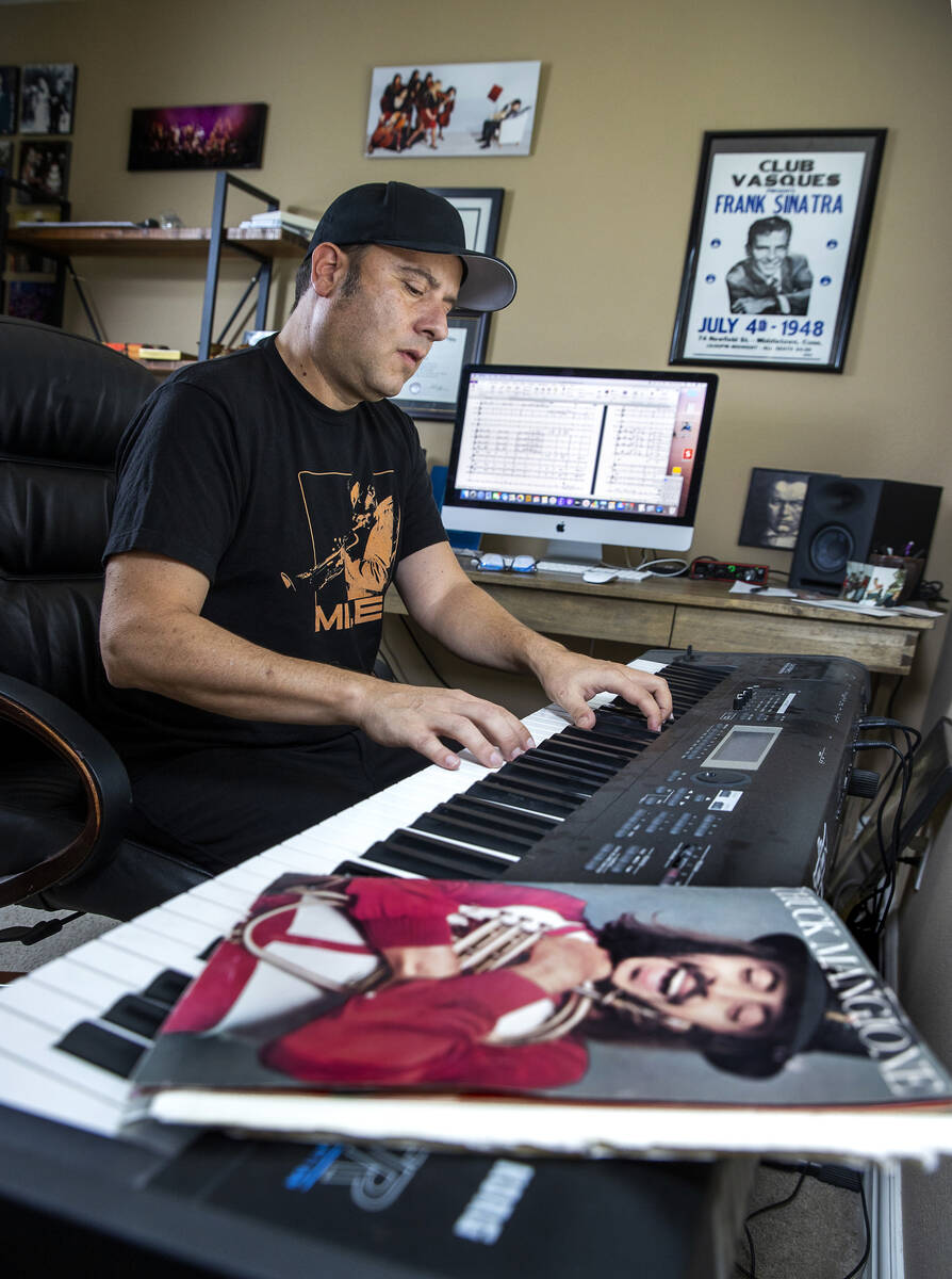 David Perrico rehearses a song as a songbook by friend Chuck Mangione rests on the piano nearby ...