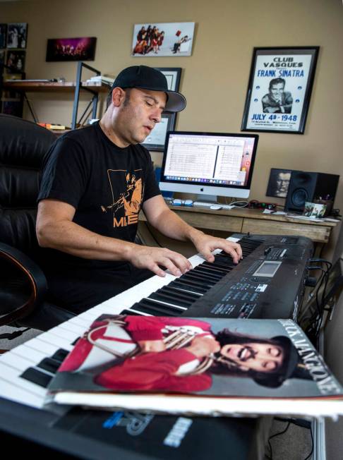 David Perrico rehearses a song as a songbook by friend Chuck Mangione rests on the piano nearby ...