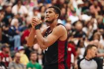 Miami Heat center Orlando Robinson gets fired up during an NBA Summer League game against the B ...
