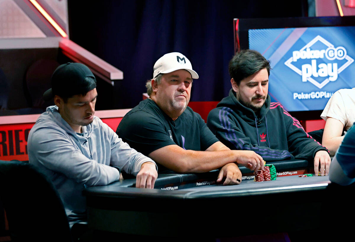 Chris Moneymaker, center, competes with Joshua Faris, left, and Alberto Cigliano, right, during ...