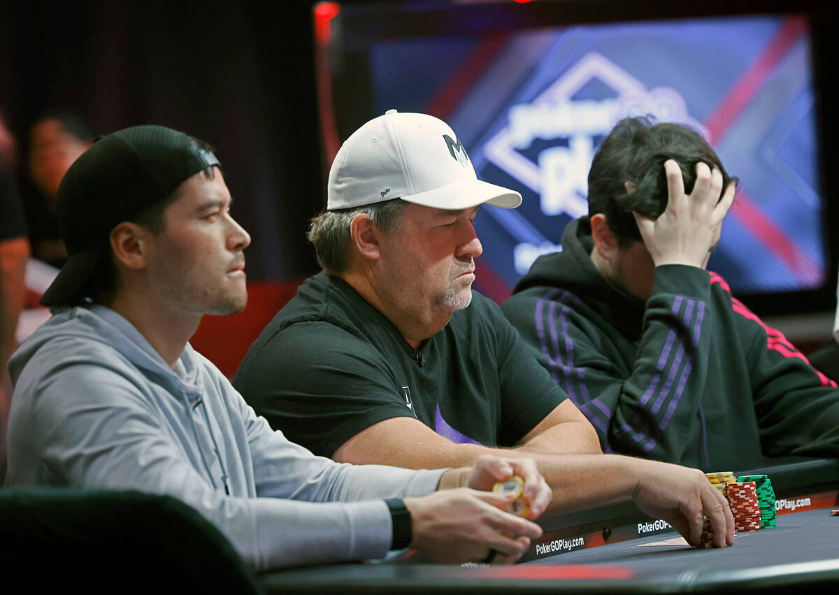 Chris Moneymaker, center, competes with Joshua Faris, left, and Alberto Cigliano, right, during ...