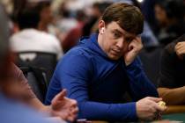 Chris Brewer competes with other players during World Series of Poker $10,000 buy-in No-limit H ...