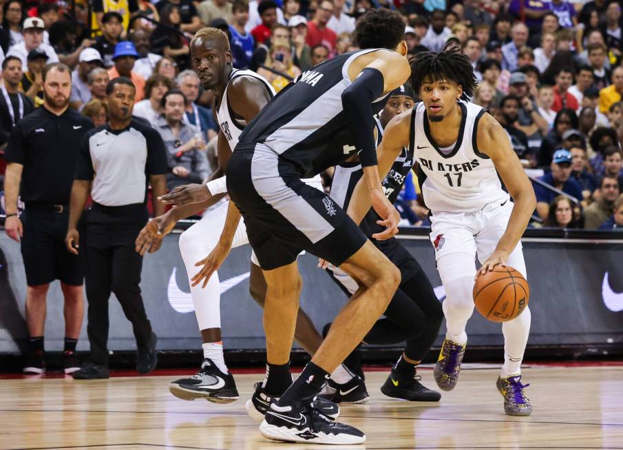 Portland Trailblazers guard Shaedon Sharpe (17) looks to move the ball past San Antonio Spurs f ...