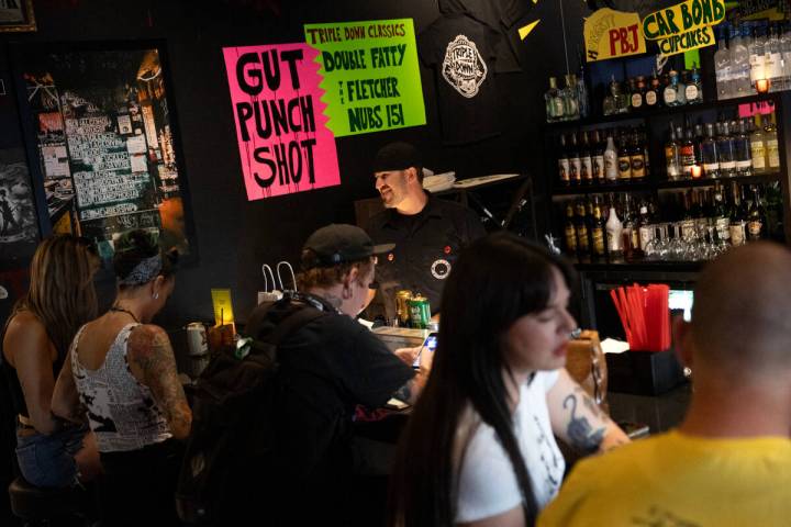 Bartender Mean Gene works the bar at The Triple Down in The Punk Rock Museum on Thursday, July ...