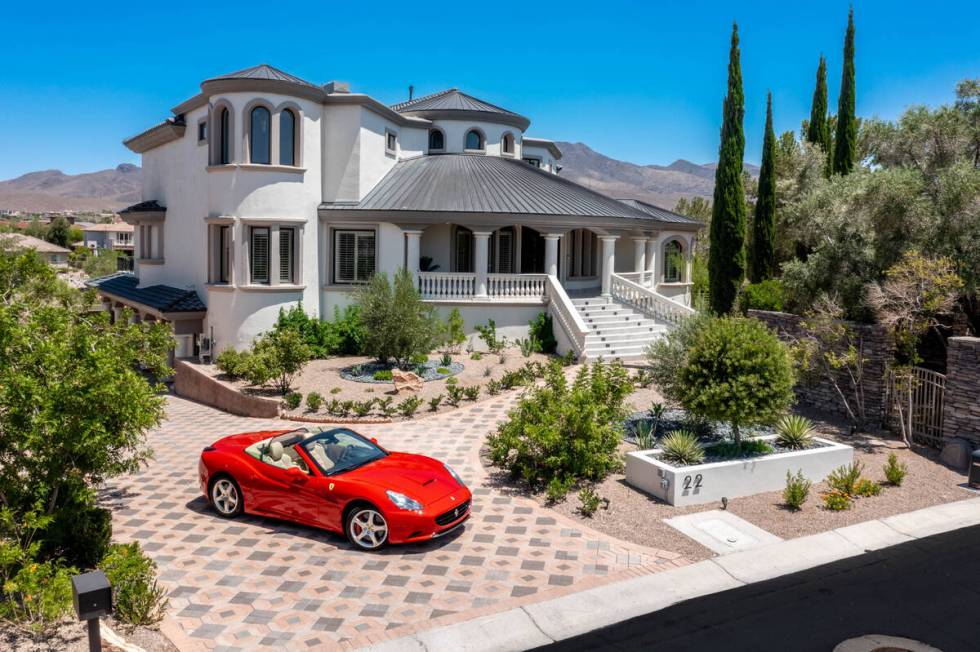 Realtor Jordan Betten is offering a free Ferrari with this $4.8 million mansion in Henderson in ...