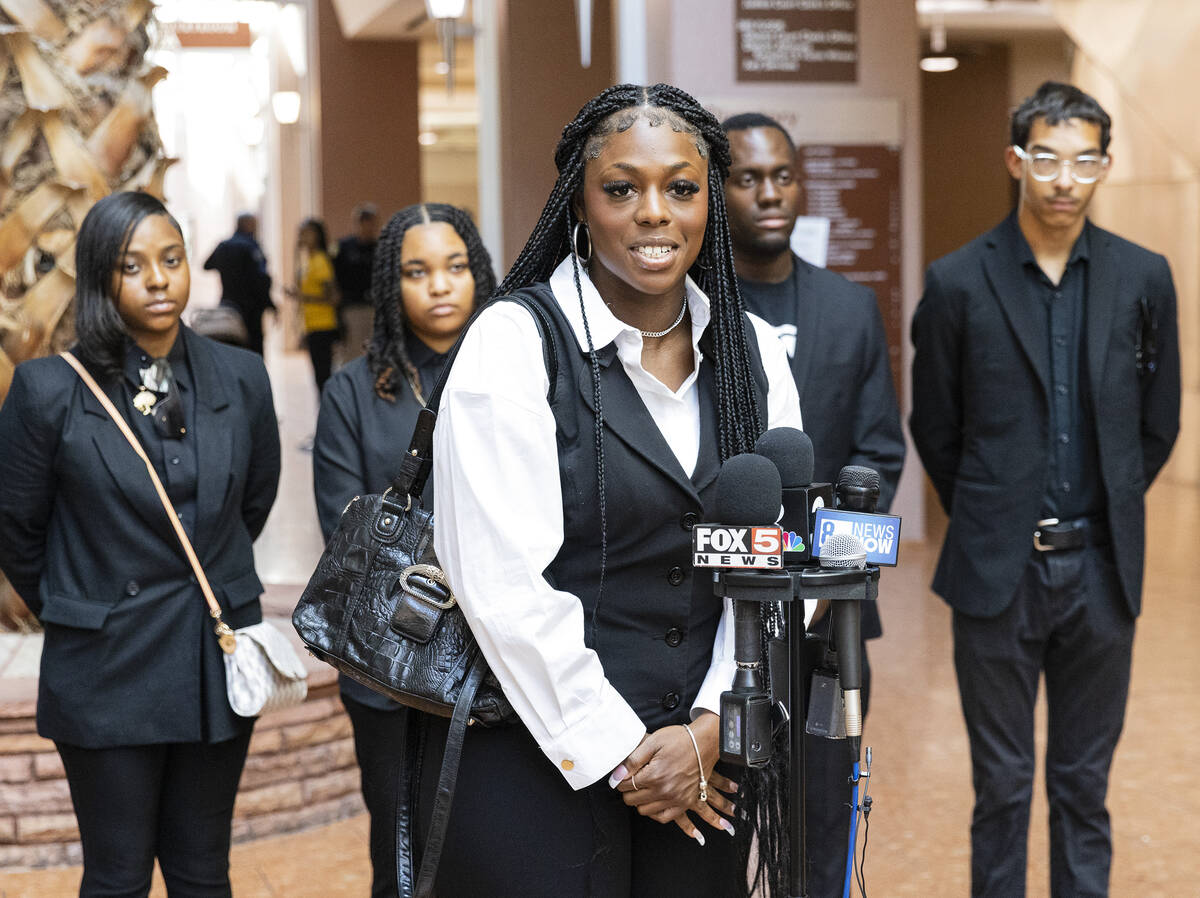 Derrica Daniel, ACLU of Nevada Emerging Leaders president, addresses the media before a hearing ...