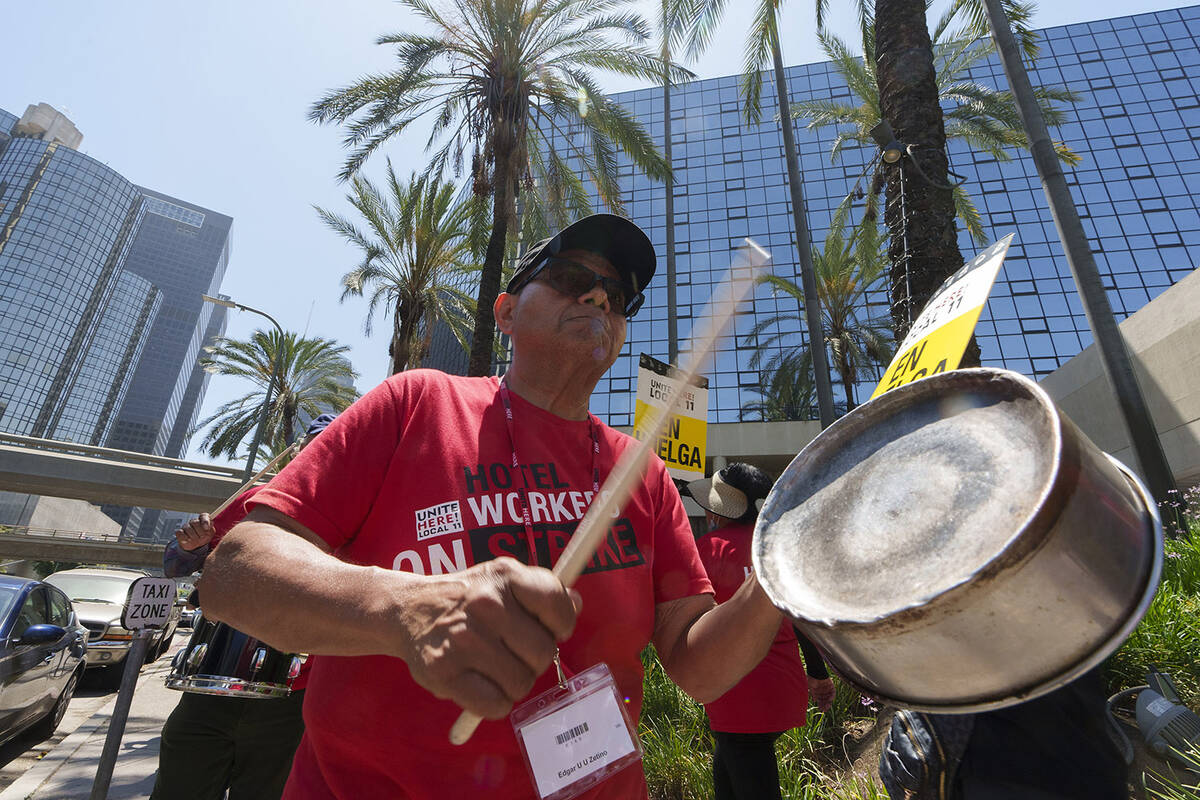 Striking hotel workers rally outside The L.A. Grand Hotel Downtown, Tuesday, July 4, 2023, in d ...