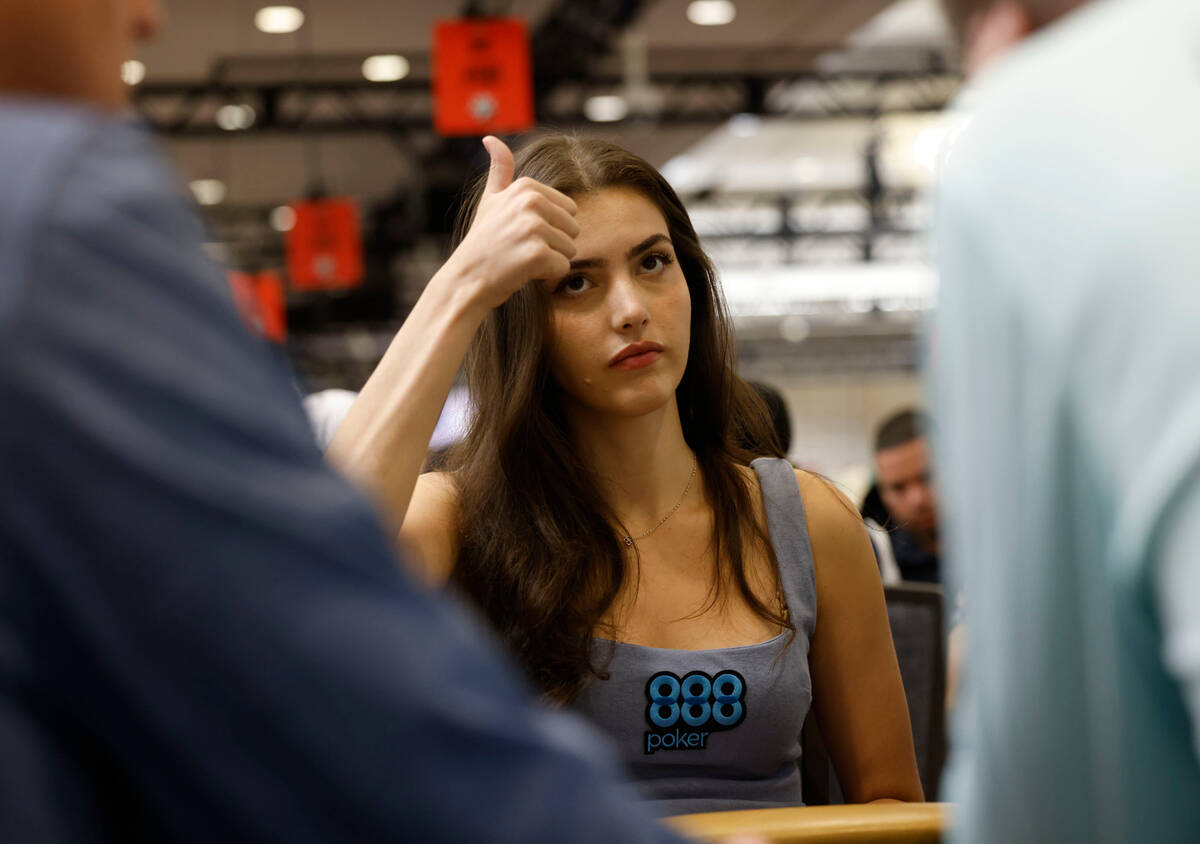Alexandra Botez gestures as competing with other players during World Series of Poker $10,000 b ...
