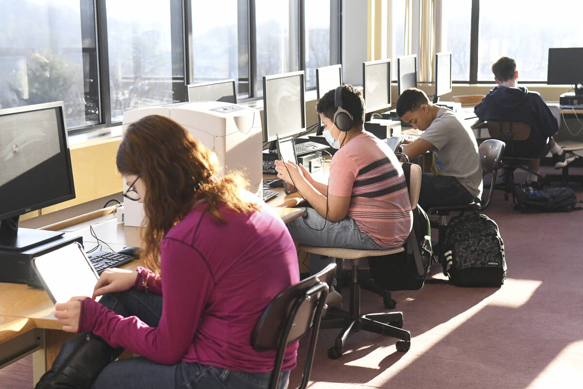 Students work in the library during homeroom at D.H.H. Lengel Middle School in Pottsville, Pa., ...