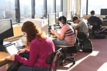 Students work in the library during homeroom at D.H.H. Lengel Middle School in Pottsville, Pa., ...