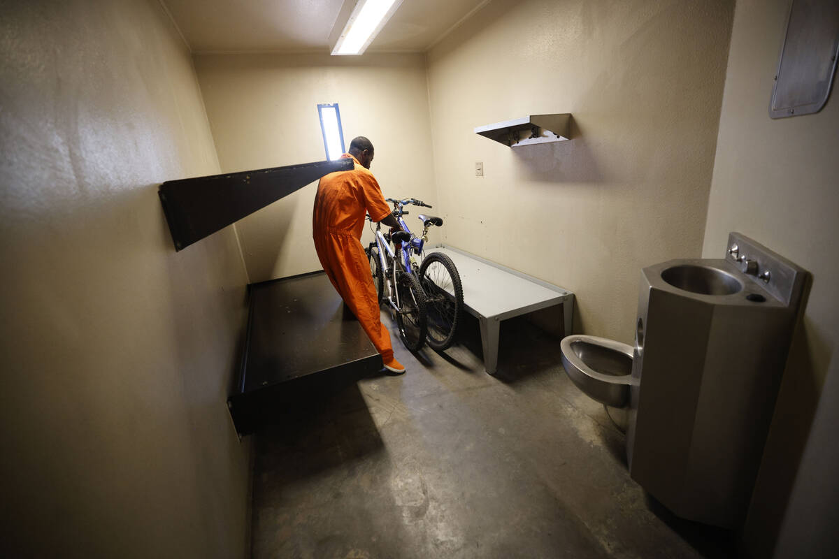 Inmate Ryan Brandon takes a bike to their facility after National Bikes for Veterans brought bi ...