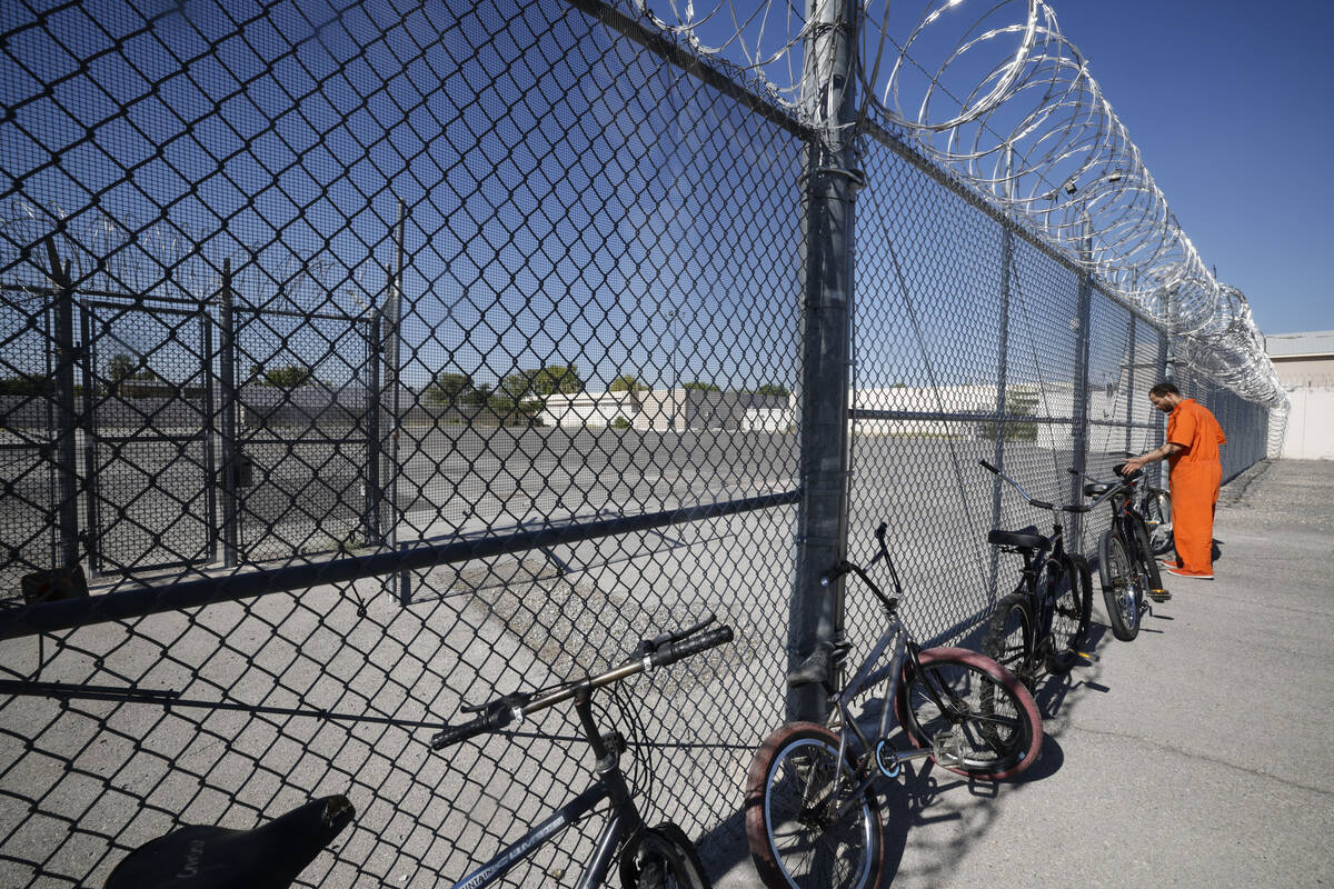 Inmate Jacquar Sprinkle lines up bikes at North Las Vegas Community Correctional Center, Tuesda ...