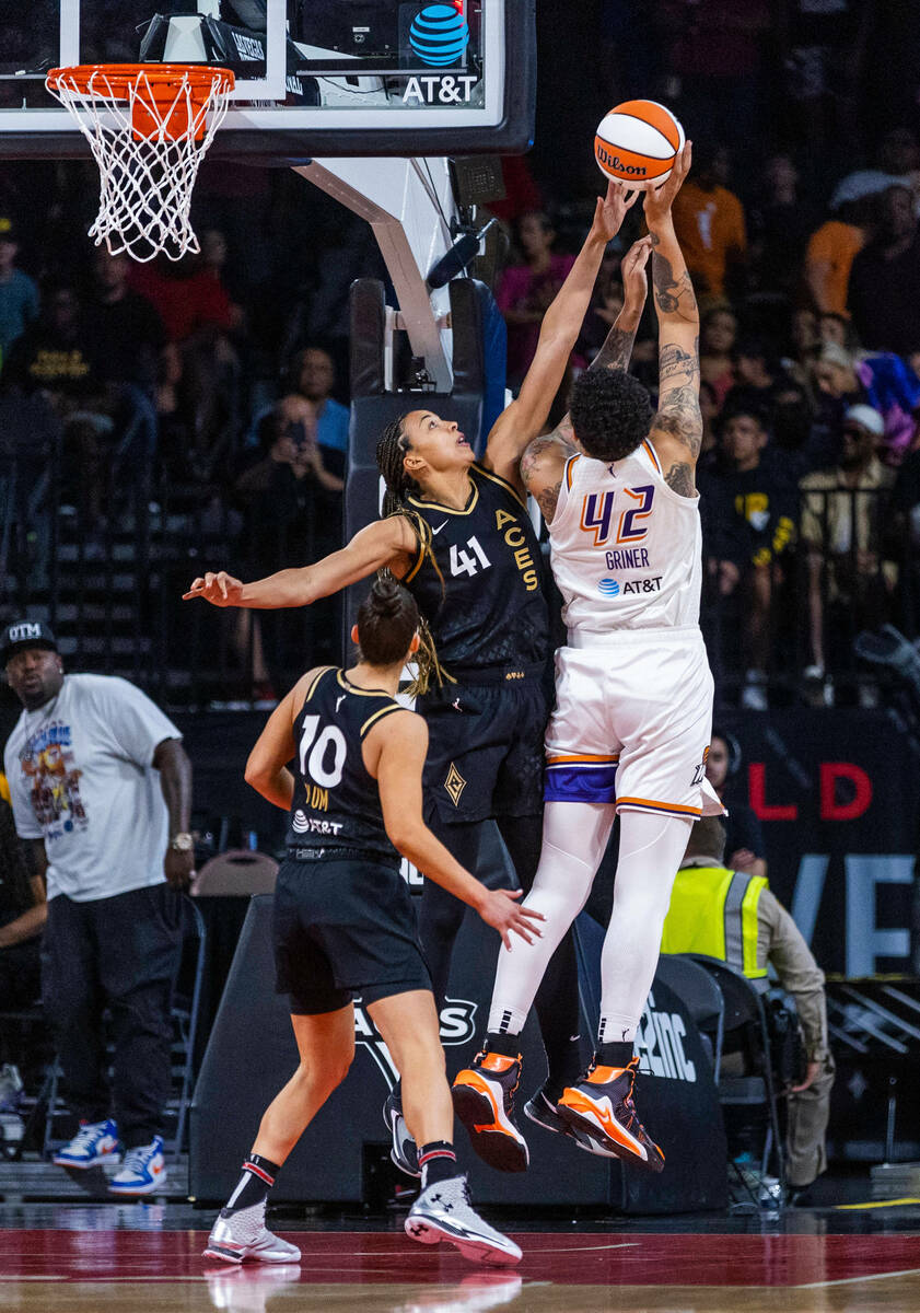 Las Vegas Aces center Kiah Stokes (41) rejects a shot by Phoenix Mercury center Brittney Griner ...