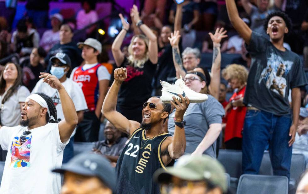 Aces fans go a bit wild for another shoe give-away as they blow out the Phoenix Mercury during ...