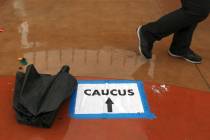 Voters arrive to register for the caucus at the East Las Vegas Community Center in February 202 ...