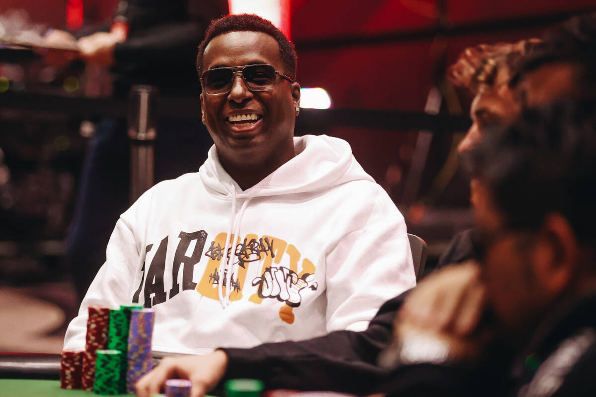 Maurice Hawkins smiles while competing in a card game during the World Series of Poker $10,000 ...