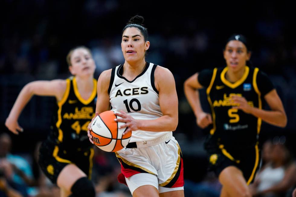 Las Vegas Aces guard Kelsey Plum (10) brings the ball up during the first half of the team's WN ...