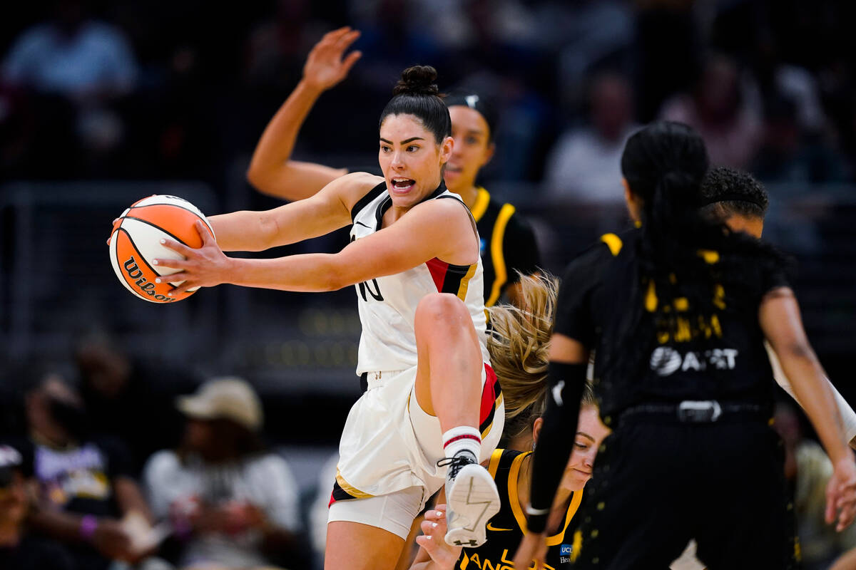 Las Vegas Aces guard Kelsey Plum (10) comes away with the ball during the first half of the tea ...