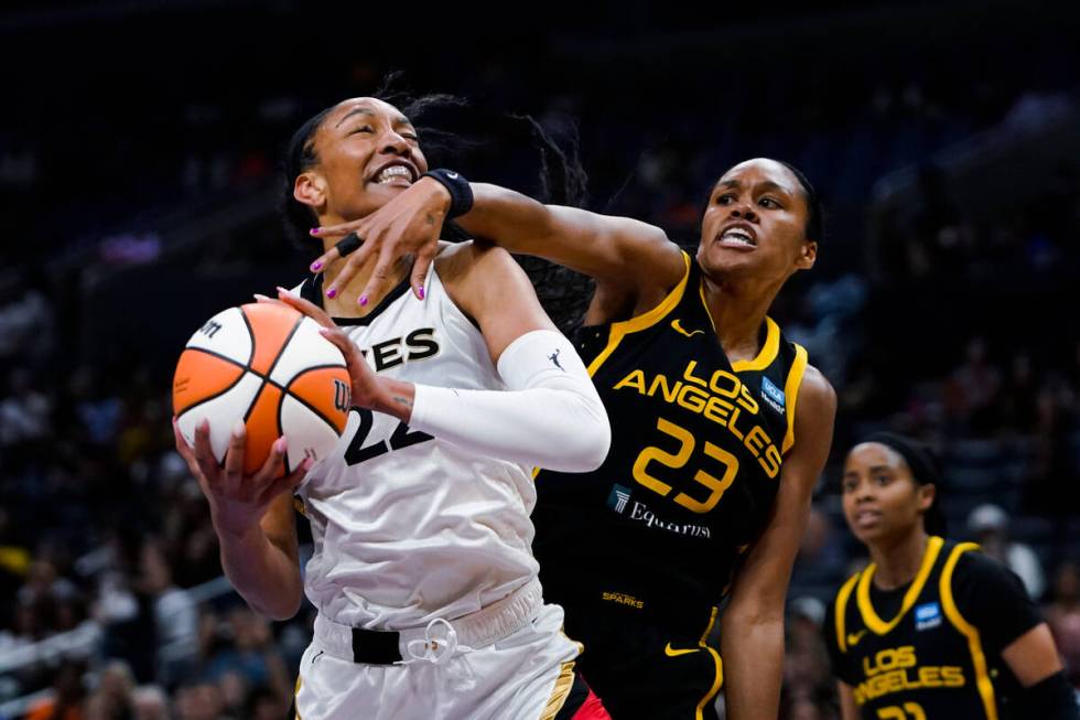 Las Vegas Aces forward A'ja Wilson (22) looks for a shot as Los Angeles Sparks forward Azura St ...