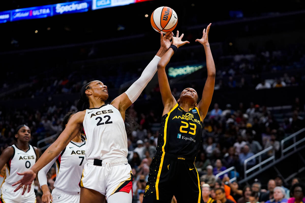 Las Vegas Aces forward A'ja Wilson (22) tips the ball against Los Angeles Sparks forward Azura ...