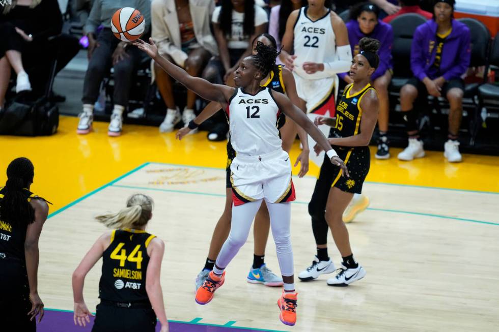 Las Vegas Aces guard Chelsea Gray (12) shoots during the first half of a WNBA basketball game a ...