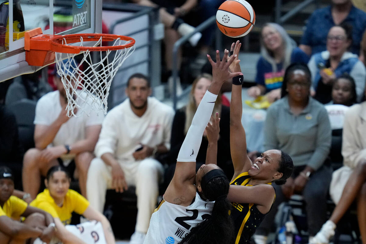 Las Vegas Aces forward A'ja Wilson (22) defends against Los Angeles Sparks forward Azura Steven ...