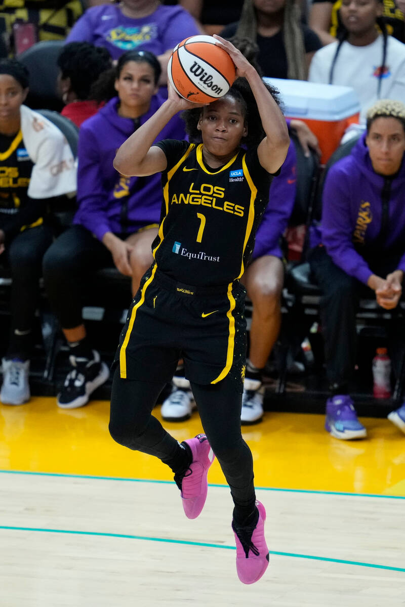 Los Angeles Sparks guard Zia Cooke (1) shoots during the second half of a WNBA basketball game ...