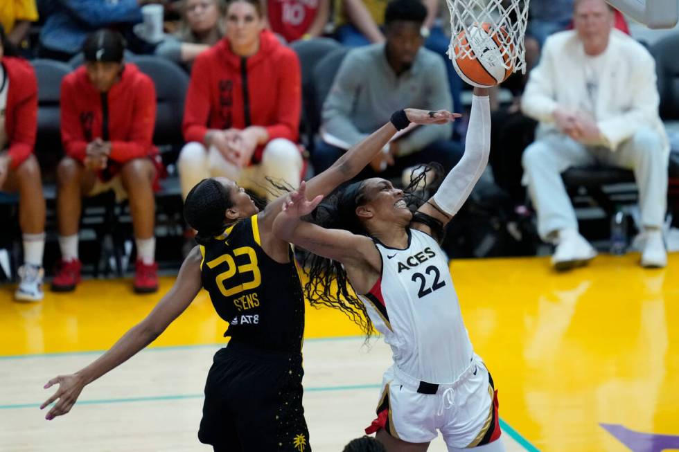 Los Angeles Sparks forward Azura Stevens (23) defends against Las Vegas Aces forward A'ja Wilso ...