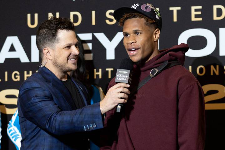 Devin Haney speaks with emcee Mark Shunock after arriving to MGM Grand ahead of his Saturday ni ...