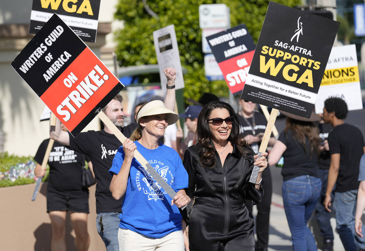 FILE - Meredith Stiehm, left, president of Writers Guild of America West, and Fran Drescher, pr ...