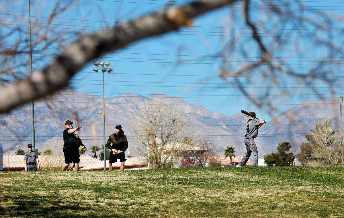 Patrons play baseball at Desert Breeze Park in Las Vegas on Sunday, Feb. 18, 2018. (Las Vegas R ...