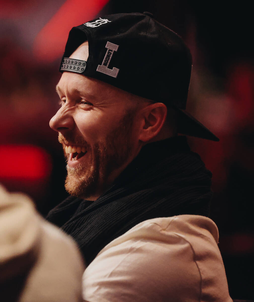 Steven Jones laughs with a competitor during the World Series of Poker $10,000 buy-in No-limit ...