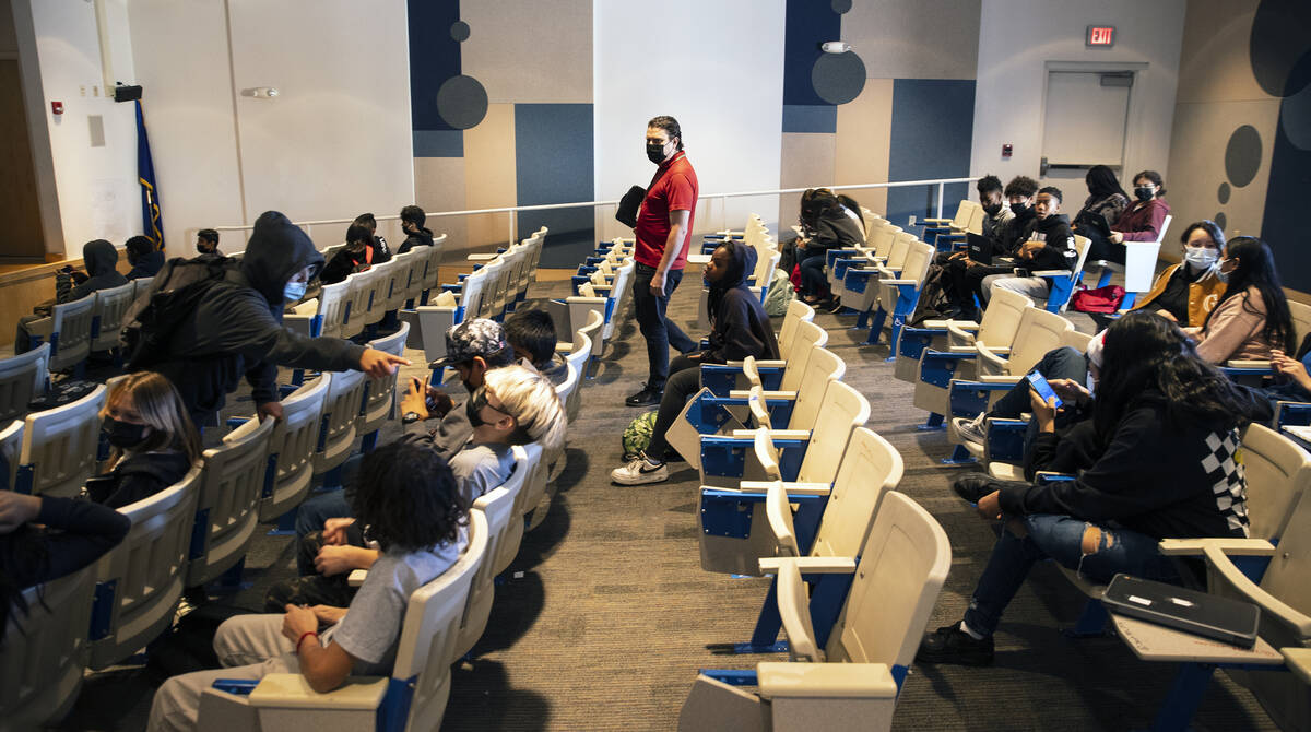 Zackery Kimball, a substitute teacher at Bailey Middle School, works with two classes of studen ...