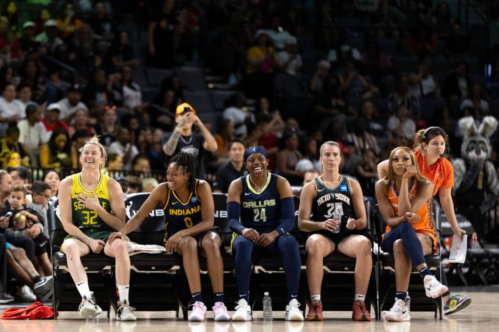 Seattle Storm guard Sami Whitcomb, left, Indiana Fever guard Kelsey Mitchell, Dallas Wings gua ...