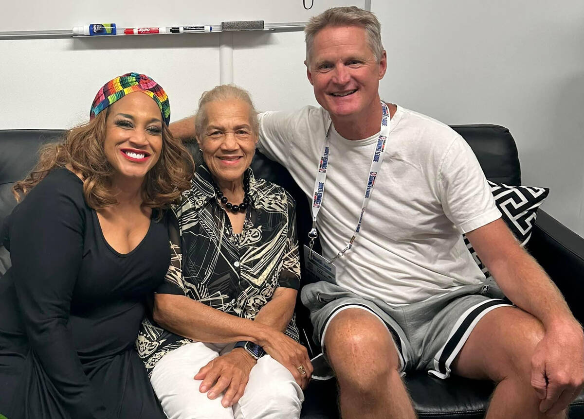 Michelle Johnson, left, and Warriors head coach Steve Kerr are shown with Michelle's mother and ...