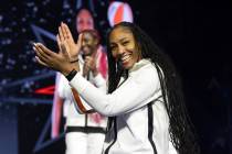 Las Vegas Aces' A'ja Wilson, captain of Team Wilson, claps as her team is introduced before the ...