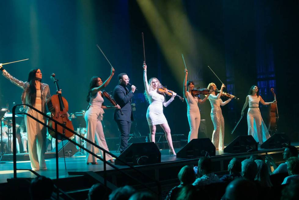 The string section of David Perrico's Pop Symphonic orchestra is shown at Reynolds Hall at the ...