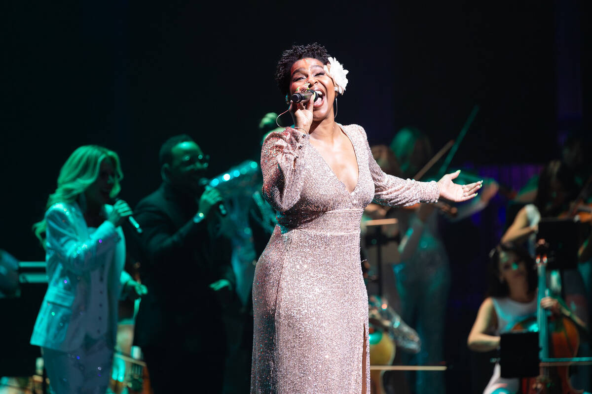 Serena Henry is shown singing with David Perrico's Pop Symphonic orchestra at Reynolds Hall at ...