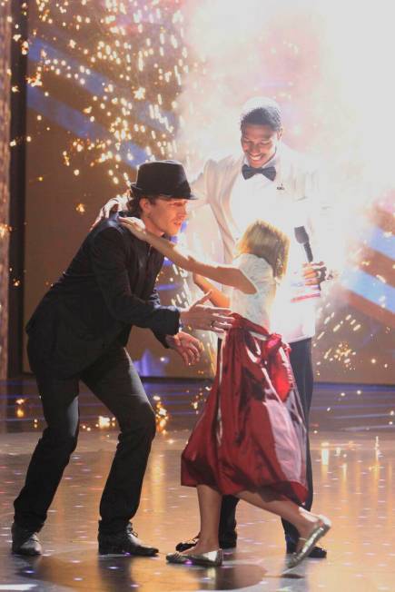 Michael Grimm, Nick Cannon and Jackie Evancho are seen on "America's Got Talent" in 2010. (Trae ...