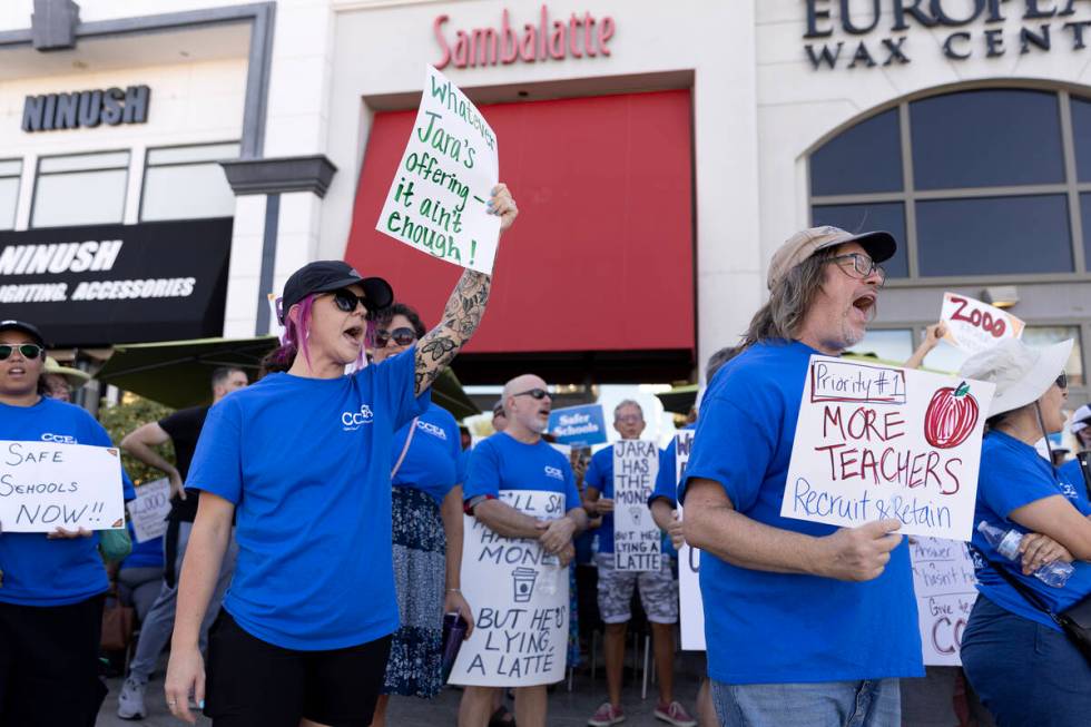 Brittanie Bluhm, center left, a GATE teacher at James H. Bilbray Elementary School, and Robert ...