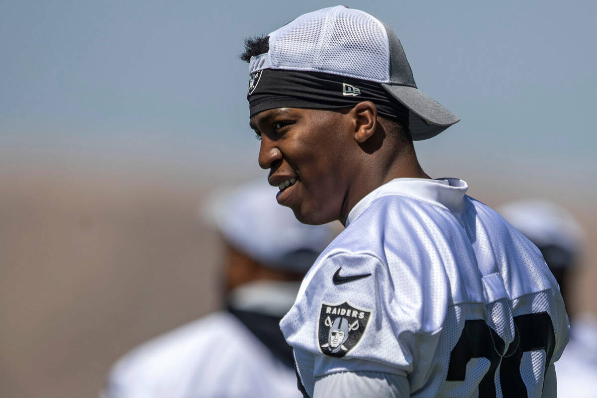 Raiders running back Brittain Brown (38) warms up during an organized team activity practice at ...