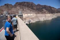 People visit the Hoover Dam in Boulder City, Nev., Monday, May 30, 2022. (Erik Verduzco / Las V ...